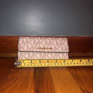 Cream Michael Kors tri-fold wallet